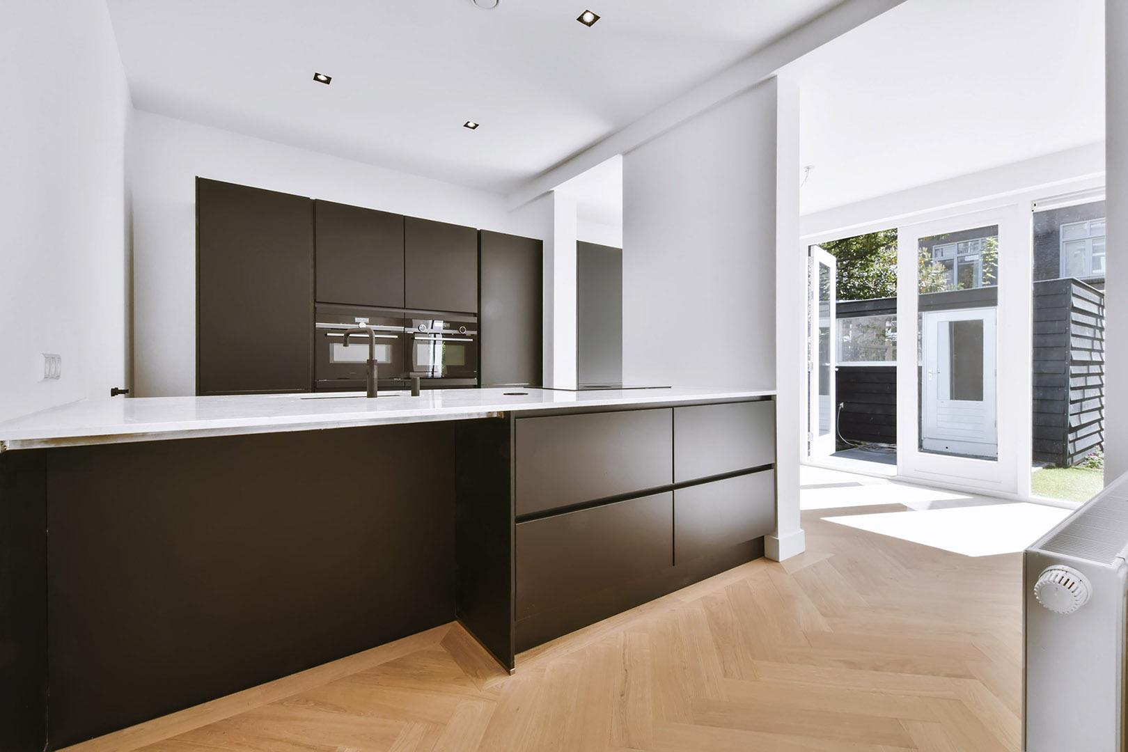 Home Page stylish kitchen in daylight with a black kitchen s 2022 03 03 00 14 44 utc.jpg